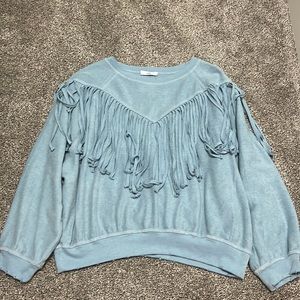 Light blue tasseled pull over
